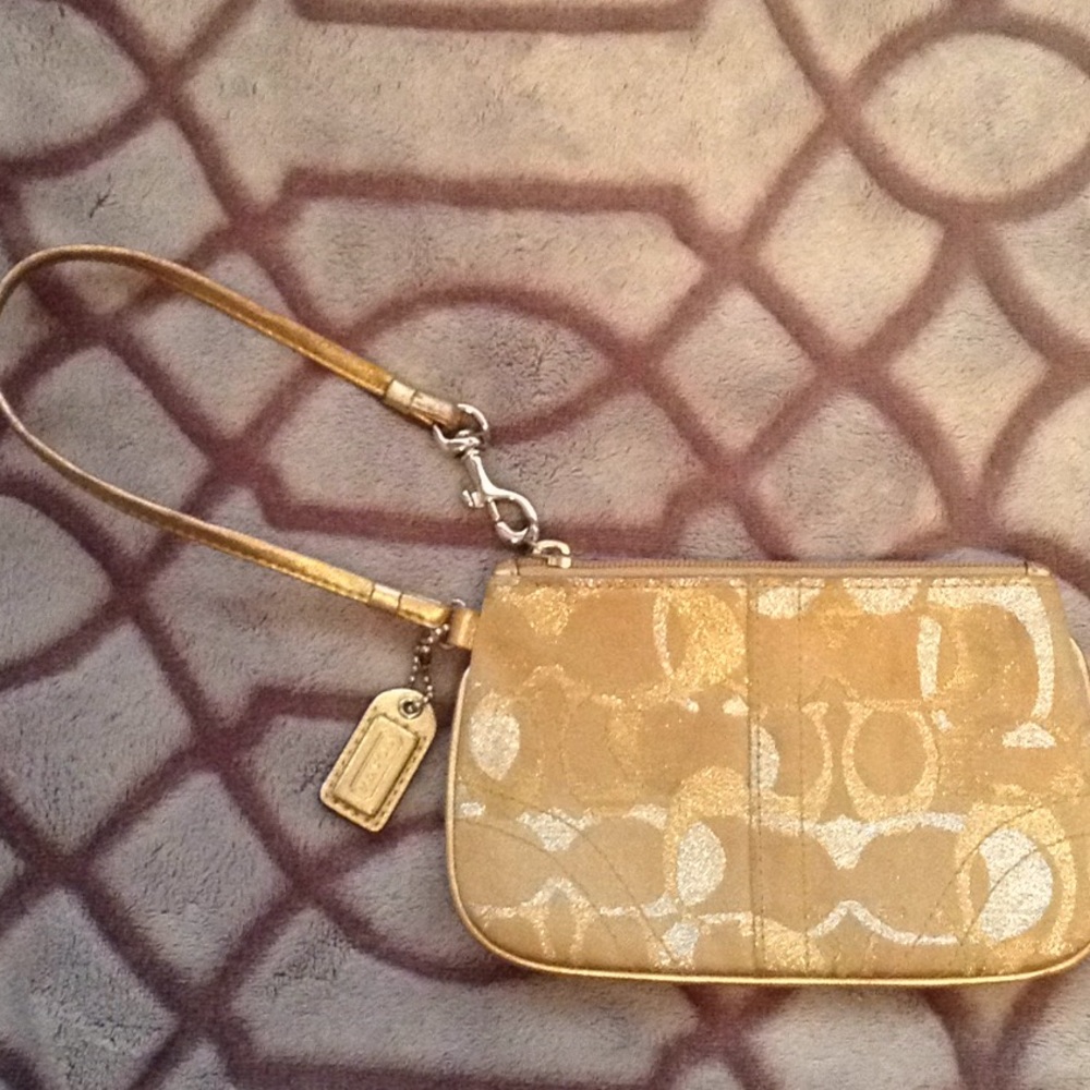 Gold and silver Coach wristlet